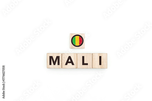 Wooden blocks bearing the name and flag of Mali. Malian and Islam Culture, national identity, travel, and geography in an advertising space design.