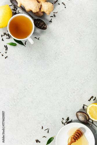 Herbal Tea with Ginger, Lemon, and Honey on Light Background