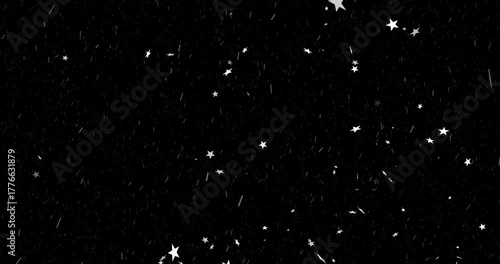 Sequence opening showing white star shapes and streaks drifting as shimmering deep-space snow scene