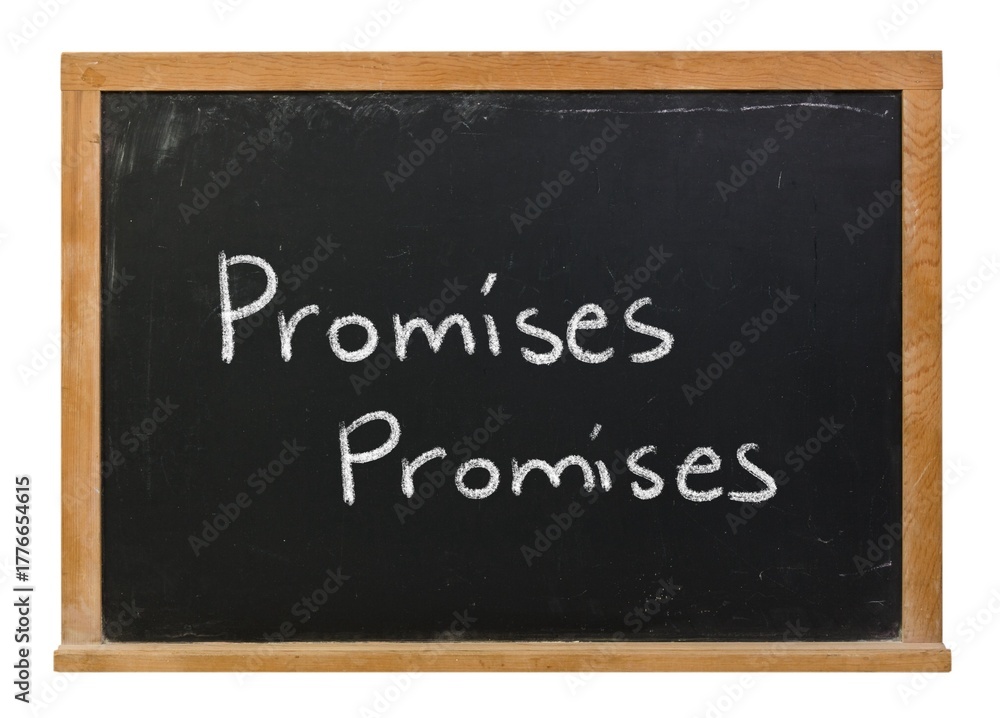 Fototapeta premium Promises promises handwritten in white chalk on a black chalkboard isolated in a wooden frame