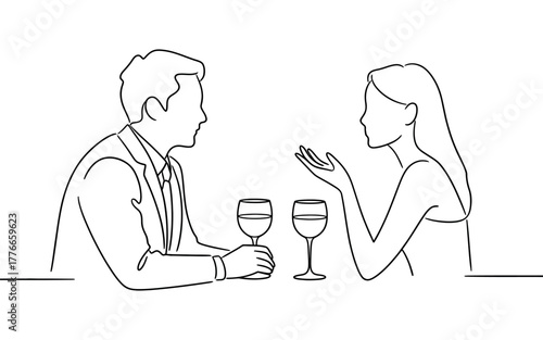 Couple sharing an intimate conversation over wine, enjoying a romantic evening together.