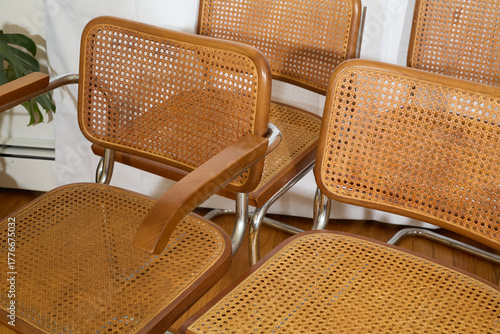 Closeup of cane seat and back on Marcel Breuer Cesca cantilever chair
