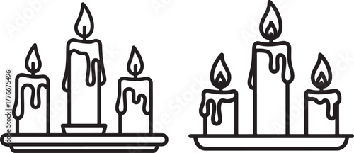 Two sets of dripping candles silhouette