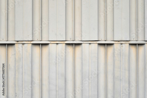 Paneled white metal wall