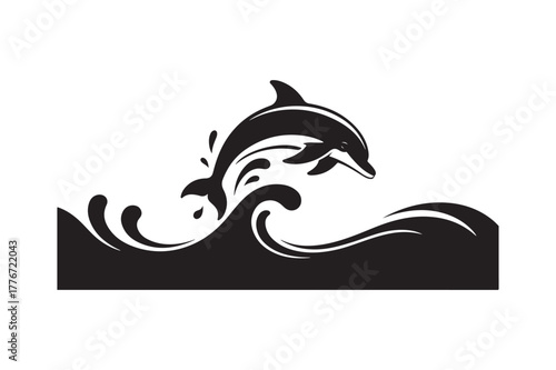 Silhouette of a dolphin leaping over a wave