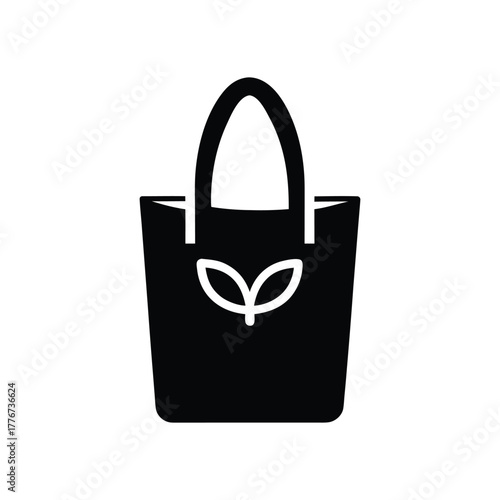 A simple, clean, and modern black silhouette of a reusable shopping bag with a small leaf design, perfect for eco-friendly branding and sustainable lifestyle visuals