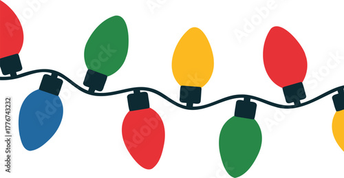 Vibrant string of classic christmas lights in red green blue and yellow bulbs on a white background