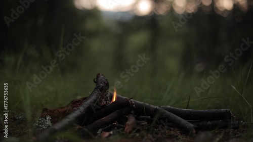 Lighting a fire by striking sparks from a flint