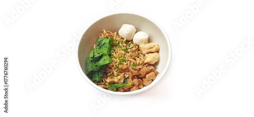 Mie Ayam Indonesian Chicken Noodle Soup with Fish Balls in a Bowl Isolated on White Background. Food Photography