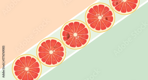 Freshly Sliced Grapefruit in A Diagonal Composition with Creative Color Background