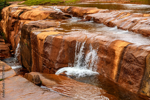River flowing over rocks and forming small waterfalls in the state of Minas Gerais, Brazil.