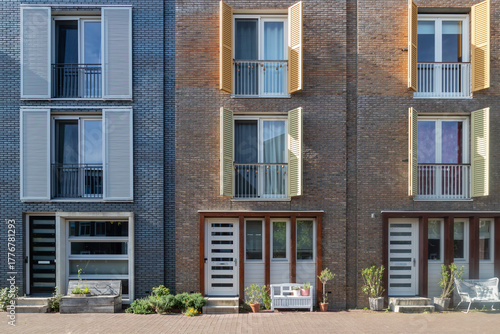 Modern terraced houses with shutters in different colors in the new Vathorst district in Amersfoort.