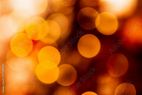 Blurred warm red and golden Christmas lights. 