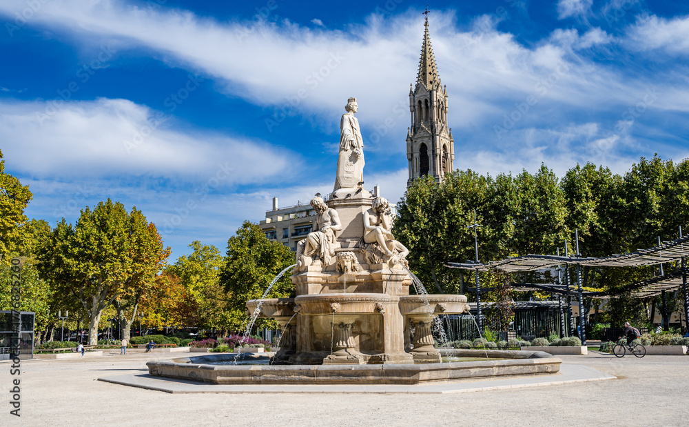 Fototapeta premium The Pradier Fountain (Fontaine de Pradier) in Nîmes, Provence, Occitanie, France, Europe