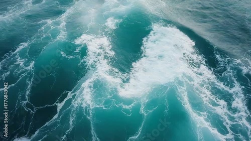 Witness the raw power and untamed beauty of the ocean as towering waves crash and churn, forming intricate patterns and textures with their foamy embrace.