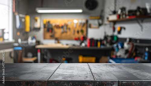 Blank rough metal workshop and desk table surface on blurred garage background with copy space, Empty space for your products and crafty idea in man cave studio