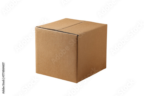 A closed, light beige cardboard box, square in shape, sits isolated on a black background.  The box has a simple, unadorned surface, and a visible crease/line down the middle