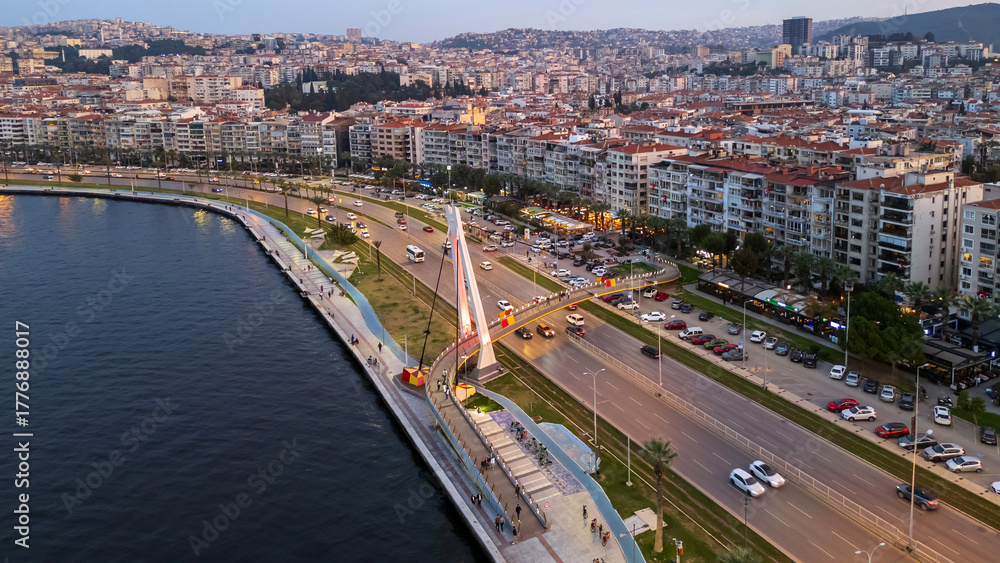 Fototapeta premium Aerial view of Göztepe coast and city traffic in İzmir Konak at dusk