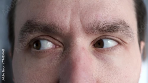 Close up eyes of a man. Eye exercises gymnastics for vision look.