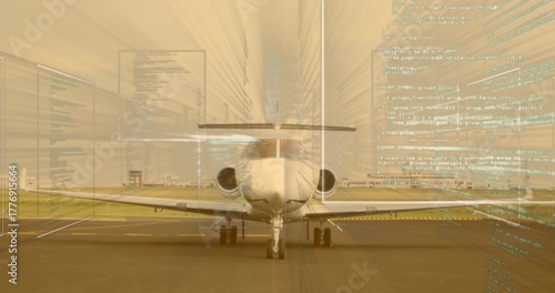 Displaying white business jet sitting on airport tarmac, runway markings, grass, code overlay
