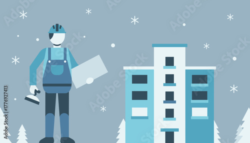 Construction worker in uniform with plans standing outside a blue building during snowfall