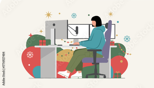 Creator working on a computer in a festive Christmas decorated home office setup