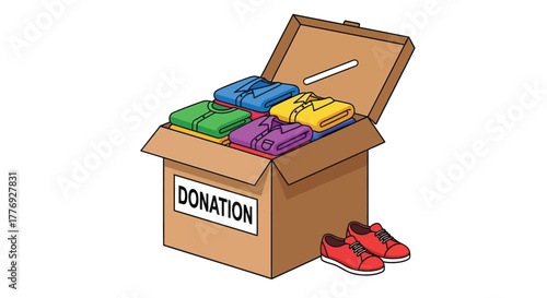 A cardboard box overflows with donated clothes and a pair of shoes
