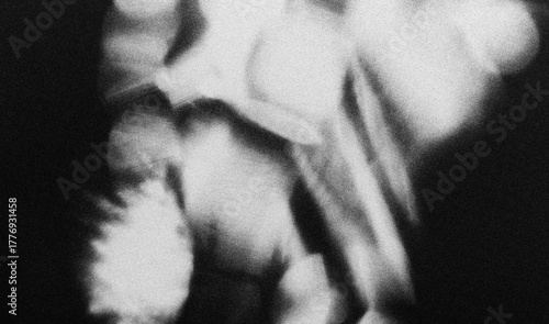 Photocopies of a black and white sheet of paper with a background or texture with grain and noise illustration