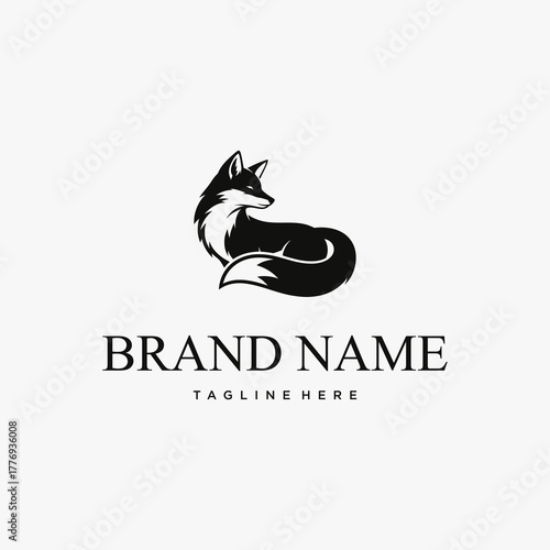 A minimalist black and white logo featuring a stylized fox sitting and looking to the side.