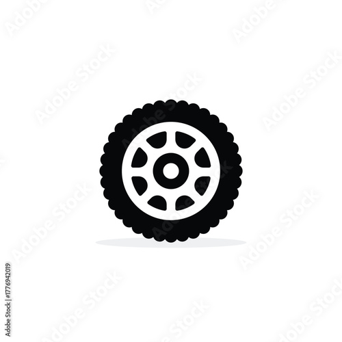 Single black off-road tire and wheel vector icon with deep, all-terrain tread pattern