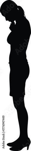 Silhouette of a Woman in a Contemplative Pose with Head Down