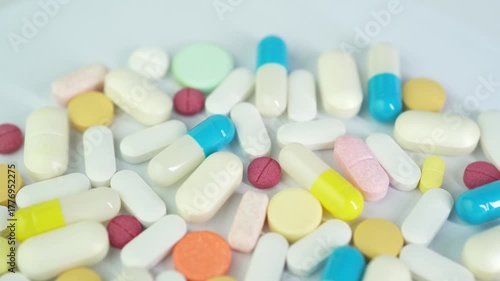 Assorted colorful pills and capsules, vitamin food supplements drugs Medicine softgel medical