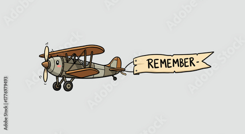 Vintage Airplane with a Banner Displaying the Word Remember.