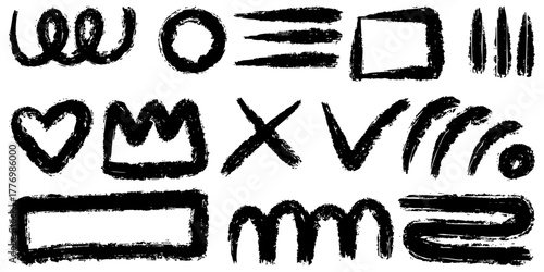 collection of hand drawn brush stroke shapes and doodle elements in black ink on white background.