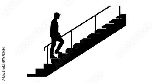 Silhouette of a man walking up a flight of stairs