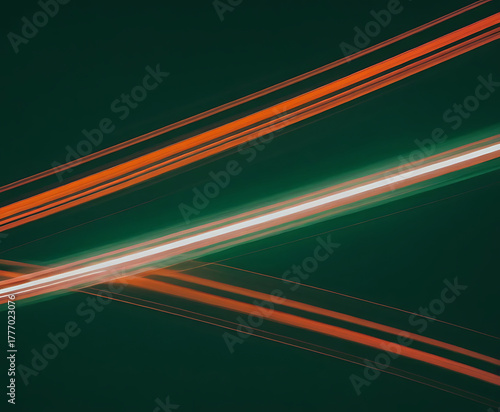 dynamic intersecting neon lines in teal and orange forming energetic crisscross motion on dark canvas, futuristic long‑exposure light streak composition