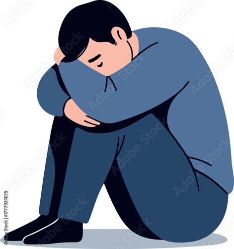 Sad Man Sitting In Blue Outfit Feeling Alone And Depressed
