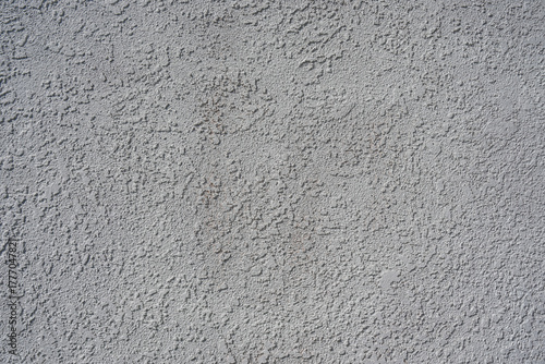 Gray stippled stucco exterior wall texture details