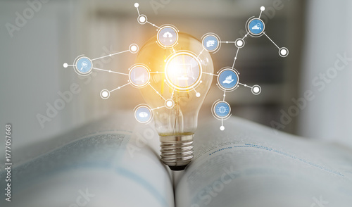 A striking image of a light bulb representing innovation is set on an open book, showcasing the fusion of technology and knowledge with various connected icons. Tessel © InfiniteFlow