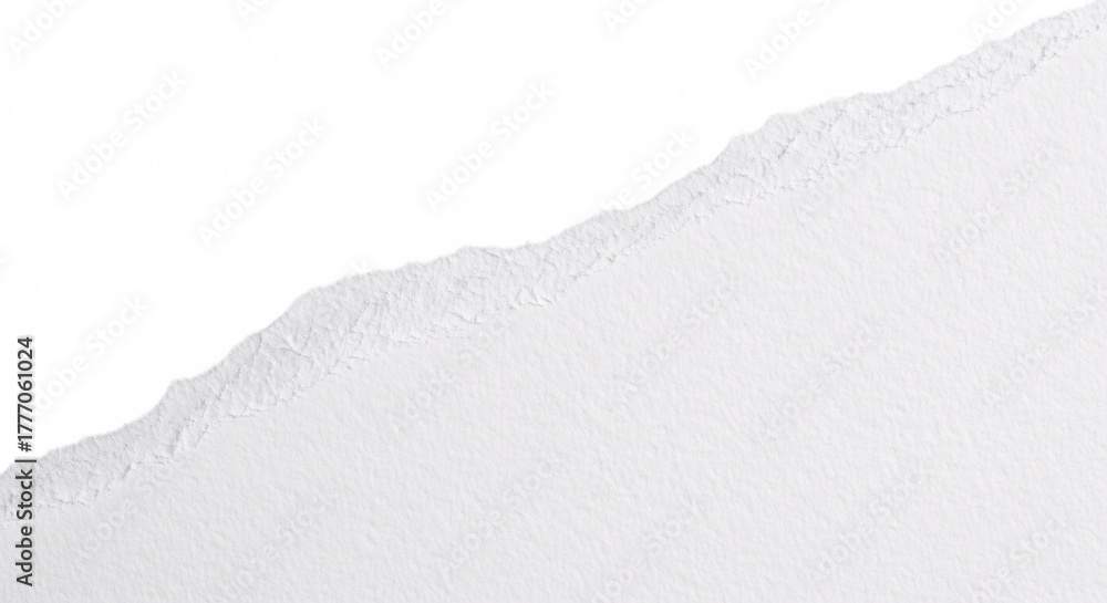 Obraz premium Dynamic close-up of a pristine white paper sheet featuring a meticulously torn, rough edge with visible fibers, offering a versatile design element for backgrounds or creative overlays
