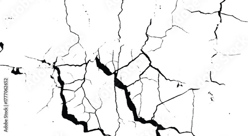 A clear diagonal black fissure on white wall