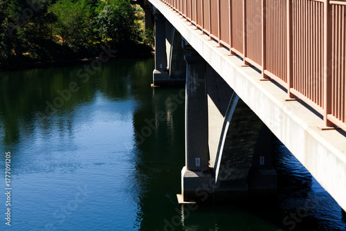 Tight Shot Of Bridge Supports In River Folsom California