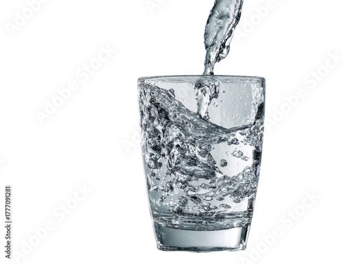 Wallpaper Mural Clear water pouring into a transparent glass, creating ripples and a dynamic splash Torontodigital.ca