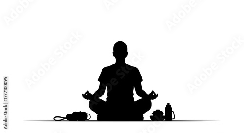 Serene silhouette meditating in lotus pose finding inner peace and balance with mindful practice, surrounded by wellness essentials for a tranquil lifestyle.
