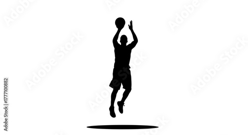 Dynamic athlete captures the thrill of the game, leaping high to shoot a basketball with intense focus and athletic grace, perfect for sports and fitness themes.