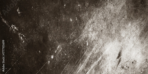 Dark and heavily distressed textured concrete surface ideal for modern industrial design.