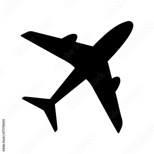 A black silhouette of a commercial airplane flying high in the sky
