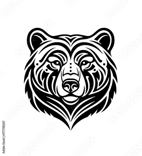 A powerful, symmetrical bear head is rendered in a black tribal tattoo style, using intricate, flowing lines and sharp angles to define its features