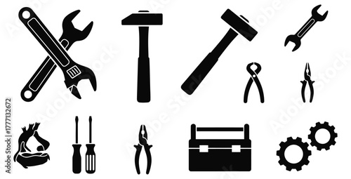 Black and white vector illustration of various hand tools for repair and construction work