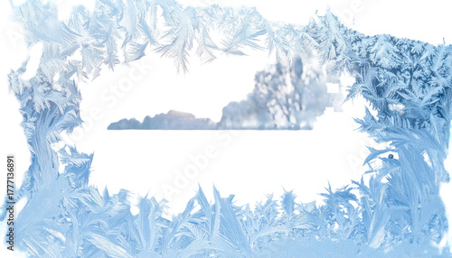 Frosty window pane with intricate ice crystal patterns